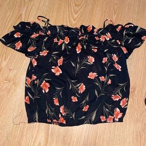 Sienna sky short sleeve black blouse with floral design